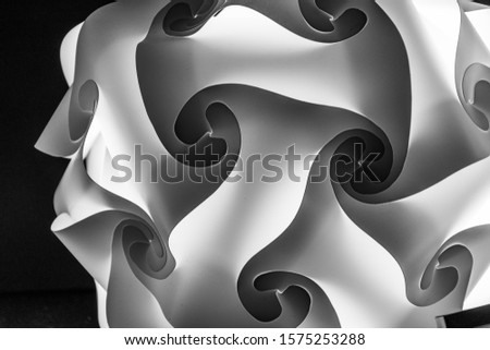 Black and white abstract photos of light puzzle shapes