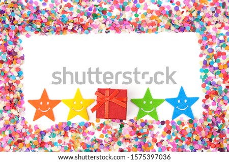 frame of colorful confetti, colored smiling star and gift box on white background. creative greeting concept, party, holiday, birthday. happy boxing day