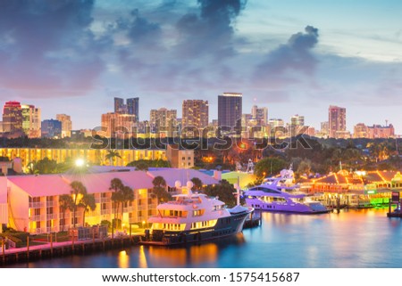 Fort Lauderdale, Florida, USA skyline and river at dusk.