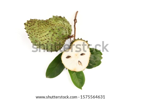 Soursop, Prickly custard apple,cut in half fruits and green leaves on a white background.