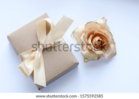 gift box with bow, perfume bottle and place for text.