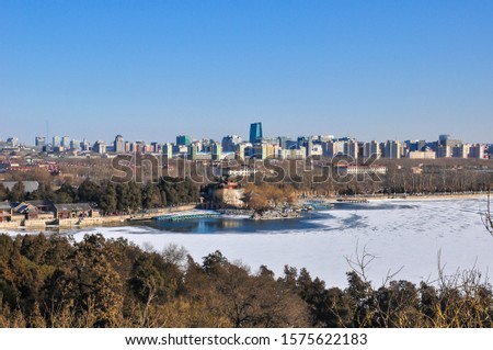 Beijing, panorama of the city center shot from the forbidden city with icy lake