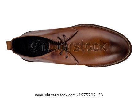 Classic fashion brown male leather boot, shoes isolated on a white background, top view, stock photography