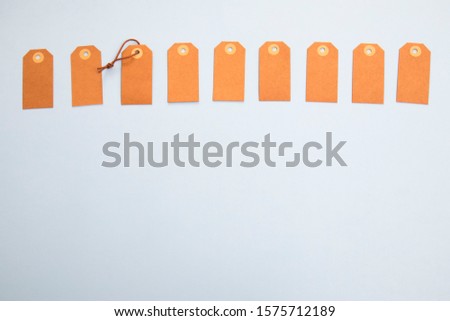 Blank labels on a blue background as a postcard design