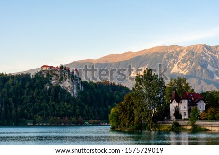 View on the Pilgrimage Church of the Assumption of Maria on the Lake Bled on a sunny autumn day.