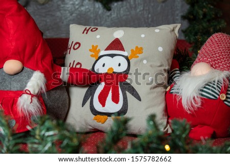 Decorative pillows with Christmas toys. penguin, Christmas pattern on pillows.