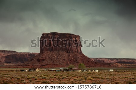 Road and rock mountain in monument valley