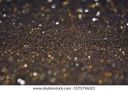 Beautiful Abstract Sparkle Glitter Lights Background. Navy Blue Lilac Violet Purple Twilight. Shine Bokeh Effect. For party, holidays, celebration. Night