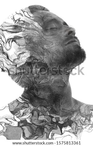 Paintography. Double exposure profile portrait of a man with strong features combined with handmade painting of wavy lines which dissolve into his skin
