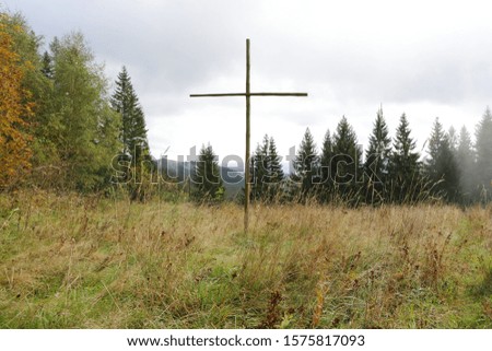 Big cross in the woods. National park Beskydy - Czech republic