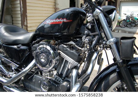 motorcycle closeup background Harley Davidson sportster Royalty-Free Stock Photo #1575858238