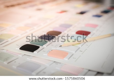 pencil and color samples palette of fabric. For fashion designs and decoration, Start up business. Royalty-Free Stock Photo #1575860506