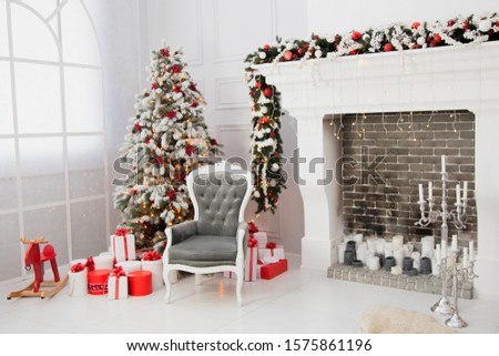 Christmas interior, fireplace and New Year tree