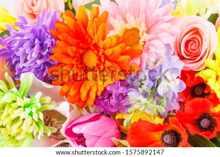 Colorful fabric flowers closeup picture.