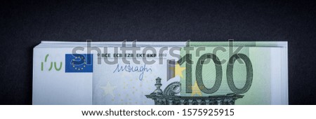 Euro cash on a pink and black background. Euro Money Banknotes. Euro Money. Euro bill. Place for text.