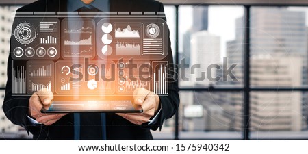 Data Analysis for Business and Finance Concept. Graphic interface showing future computer technology of profit analytic, online marketing research and information report for digital business strategy. Royalty-Free Stock Photo #1575940342