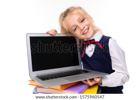 blonde girl holds laptop with mockup on white wall background