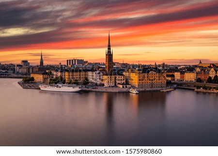 Scenic panoramic view of Gamla Stan, in the Old Town in Stockholm at sunset, capital of Sweden Royalty-Free Stock Photo #1575980860