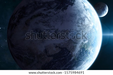 Earth and moon in blue light. Solar system. Science fiction. Elements of this image furnished by NASA
