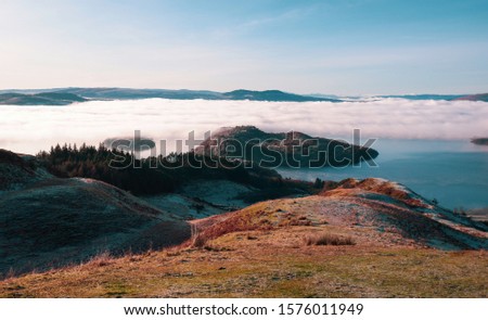 Early morning winter walk up Conic Hill, Balmaha, Loch Lomond, Scotland Royalty-Free Stock Photo #1576011949