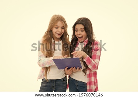 Girls cute pupils got results test. Good school marks. We passed exam. Girls with school textbook white background. School concept. Interesting information. Happy exam results. Here are exam results. Royalty-Free Stock Photo #1576070146
