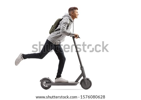 Full length shot of a male student with a backpack riding an electric scooter isolated on white background Royalty-Free Stock Photo #1576080628