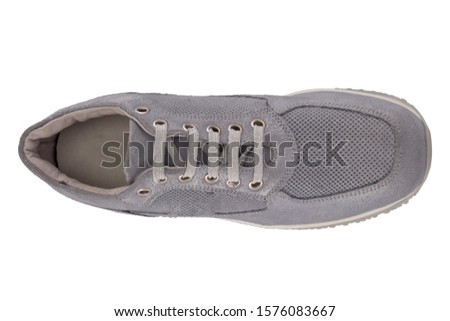 Sport  fashion silver gray male leather shoes isolated on a white background, top view, stock photography