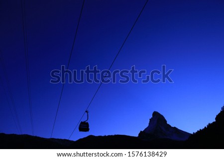 Silhouette at the Ropeway in the morning, dark blue in Zermatt, Switzerland.