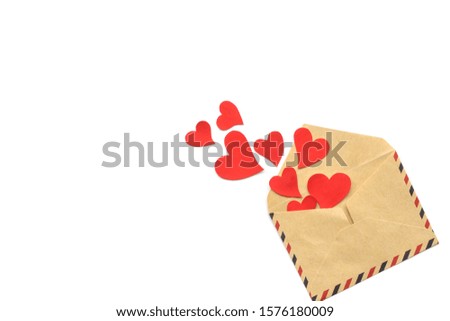 Valentine day, red hearts from the craft envelope isolated on white background. Love concept. Copyspace