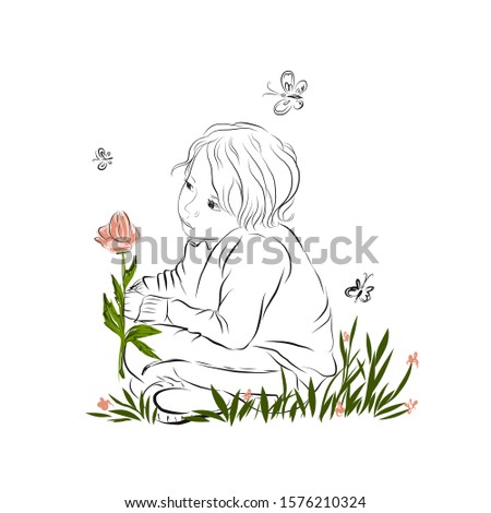 Lonely sad pensive boy sitting on grass folded legs in lotus position and holding flowers and butterflies fly around him