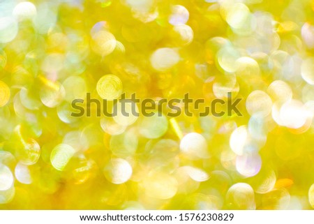 Abstract background with defocused bokeh balls for Christmas. New Year holidays backdrop with glittering lights. Real lens blur of bright winter party.