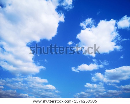 Beautiful blue sky and cloud background on sunshine day.