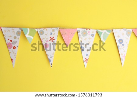 colorful party flags and triangular shape