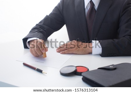 business man making contract file