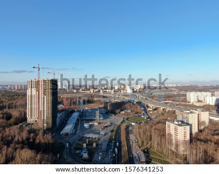 Aerial view panorama on the sunny day of the city landscape of the road highway in the Moscow district of Hovrino. Shot from drone