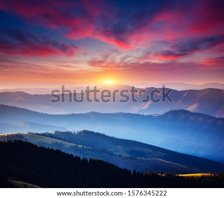 Incredible landscape in the mountains at sunset. Picture of colorful cloudy sky. Location place of Carpathian national park, Ukraine, Europe. Idyllic natural wallpaper. Discover the beauty of earth.