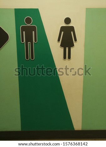 The sign to the toilets is beautiful and colorful. Separation between men and women In department stores in Thailand