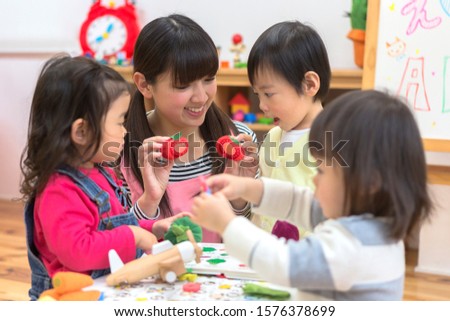 Children studying English at a nursery school
