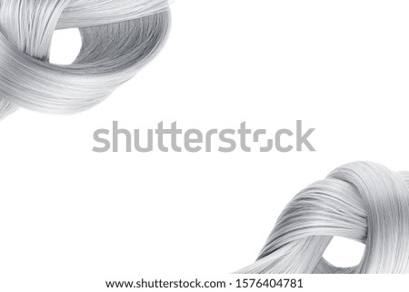Gray hair tied in knot on white background, isolated. Copy space