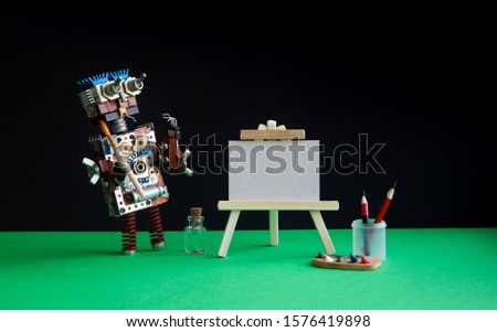Robot artist begins to create a drawing with a brush. White paper template, wooden easel, palette and painter accessories. Black green background.