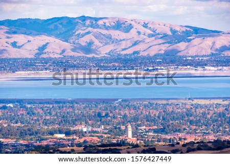 Aerial view of Palo Alto, San Francisco Bay Area; Newark and Fremont and the Diablo mountain range visible on the other side of the bay; Silicon Valley, California Royalty-Free Stock Photo #1576427449