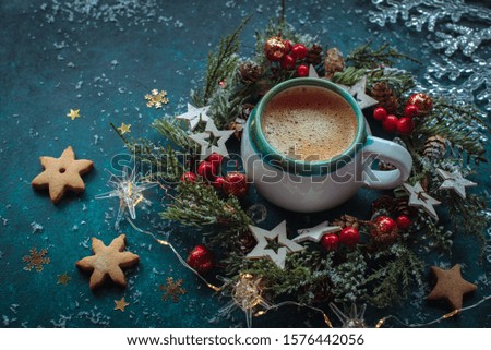 Cup of coffee with cookies, Christmas wreath, snow flakes, winter festive decorative card 
