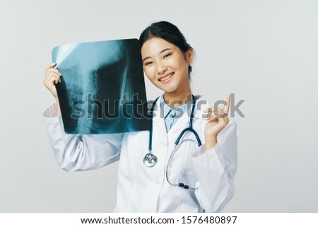 X-ray happy woman smile medical gown