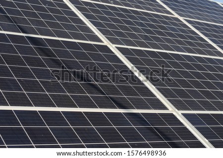 Photovoltaic cells background.The solar panel produces green, environmentally friendly energy from the sun.