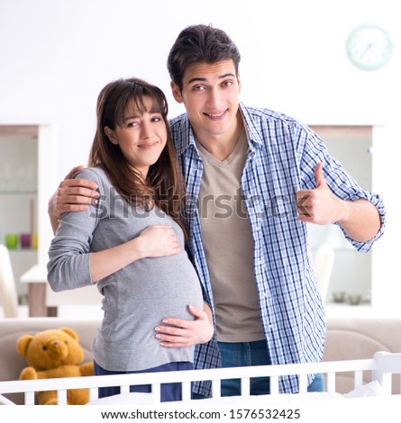 The young parents expecting their first baby