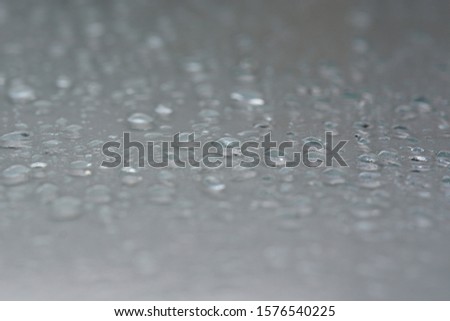 Water droplets on the floor after rain.abstract,Gray background