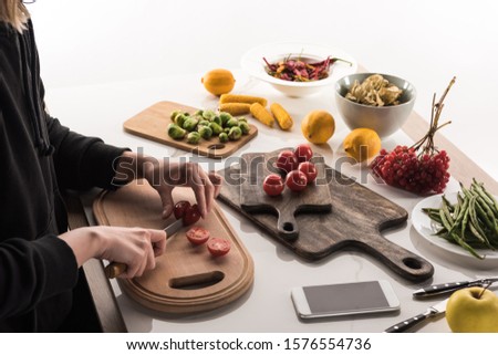 cropped view of photographer making food composition for commercial photo shoot