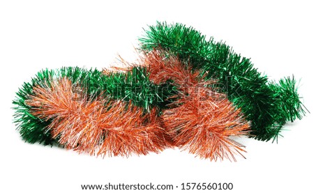 Green and orange tinsel, Christmas ornament, decoration, isolated on white background