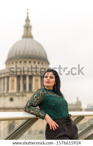 Portrait of woman with green clothes and St Paul's Cathedral