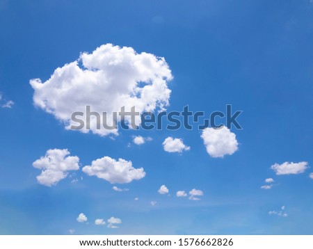 White clouds with bright sky, backdrop Royalty-Free Stock Photo #1576662826